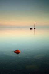 Sunrise on a misty flat calm Ayrshire coast with the wreck of the Clyde puffer KAFFIR, wrecked in September 1974.<br /><a href="https://shop.photo4me.com/picture.aspx?id=266811&f=canvas"><font>Buy Print or Canvas</font></a><a></a> <a href="https://shop.photo4me.com/picture.aspx?id=266811&f=canvas"><img src="https://www.photoscotland.net/captionpic/p4me.jpg" alt="p4me.jpg" /></a><a></a>