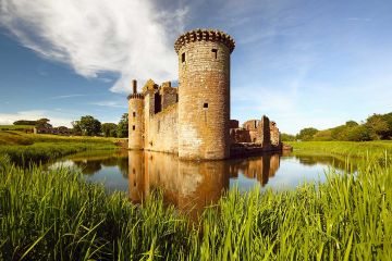 Caerlaverock Castle is a 13th century moated triangular castle located on the southern coast of Scotland.<br /><a href="https://fineartamerica.com/featured/2-caerlaverock-castle-grant-glendinning.html"><font>Buy Print or Canvas</font></a><a></a> <a href="https://fineartamerica.com/featured/2-caerlaverock-castle-grant-glendinning.html"><img src="https://www.photoscotland.net/captionpic/Pixels.png" alt="Pixels.png" /></a><a></a>