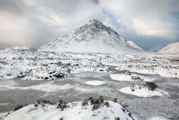 Buachaille Etive Mòr (the great herdsman of etive) mountain on a snow-covered landscape in the Scottish highlands, Glencoe, Scotland.<br /><a href="https://fineartamerica.com/featured/etive-mor-winter-grant-glendinning.html"><font>Buy Print or Canvas</font></a><a></a> <a href="https://fineartamerica.com/featured/etive-mor-winter-grant-glendinning.html"></a><a></a>