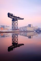 148 second exposure to help smooth out the slow-moving clouds for a dreamy look of the Clyde Waterfront. The crane was reflecting on a perfectly calm and crystal clear River Clyde. Photographed on Christmas day, Glasgow, Scotland. <br /><a href="https://fineartamerica.com/featured/finnieston-crane-reflection-grant-glendinning.html?product=canvas-print"><font>BUY PRINT</font><br /></a><a></a> <a href="https://fineartamerica.com/featured/finnieston-crane-reflection-grant-glendinning.html"><img src="https://www.photoscotland.net/captionpic/Pixels.png" alt="Pixels.png" /></a><a></a>