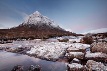 The snow covered Buachaille Etive Mor (the great herdsman of Etive) and the River Coupall during Sunrise. Glencoe, Scotland.<br /><a href="https://shop.photo4me.com/picture.aspx?id=545446&f=canvas"><font>Buy Print or Canvas</font></a><a></a> <a href="https://shop.photo4me.com/picture.aspx?id=545446&f=canvas"></a><a></a>