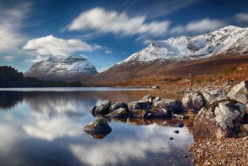 A long exposure of the impressive mountain Liathach and Beinn Eighe range reflecting on Loch Clair on a sunny winter day. Torridon, Scotland.<br /><a href="https://shop.photo4me.com/picture.aspx?id=654116&f=canvas"><font>Buy Print or Canvas</font></a><a></a> <a href="https://shop.photo4me.com/picture.aspx?id=654116&f=canvas"><img src="https://www.photoscotland.net/captionpic/p4me.jpg" alt="p4me.jpg" /></a><a></a>