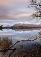 A 188 second long exposure of Loch Cul Dromannan and mountain scenery in the Scottish highlands.