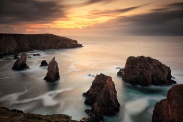 The magnificent sea stacks of Magnasta on the isle of Lewis shot at Sunset.<br /><a href="https://shop.photo4me.com/picture.aspx?id=690148&f=canvas"><font>Buy Print or Canvas</font></a><a></a> <a href="https://shop.photo4me.com/picture.aspx?id=690148&f=canvas"><img src="https://www.photoscotland.net/captionpic/p4me.jpg" alt="p4me.jpg" /></a><a></a>