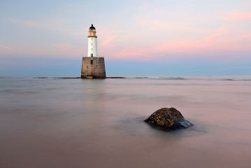 A colourful Sunset at Rattray Head Lighthouse on the north east coast of Scotland.<br /><a href="https://shop.photo4me.com/picture.aspx?id=658896&f=canvas"><font>Buy Print or Canvas</font></a><a></a> <a href="https://shop.photo4me.com/picture.aspx?id=658896&f=canvas"><img src="https://www.photoscotland.net/captionpic/p4me.jpg" alt="p4me.jpg" /></a><a></a>