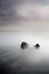 A thing in the water slowly being covered by the rising tide on the east coast of Scotland. The long shutter exposure i used gives a misty dreamy effect of the incoming tide and slow moving clouds.<br /><a href="https://pixels.com/featured/remnant-grant-glendinning.html"><font>Buy Print or Canvas</font></a><a></a> <a href="https://pixels.com/featured/remnant-grant-glendinning.html"><img src="https://www.photoscotland.net/captionpic/Pixels.png" alt="Pixels.png" /></a><a></a>