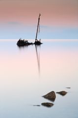Sunrise on a misty flat calm Ayrshire coast with the wreck of the Clyde puffer KAFFIR, wrecked in September 1974.
<br /><a href="https://shop.photo4me.com/picture.aspx?id=266833&f=canvas"><font>Buy Print or Canvas</font></a><a></a>   <a href="https://shop.photo4me.com/picture.aspx?id=266833&f=canvas"><img src="https://www.photoscotland.net/captionpic/p4me.jpg" alt="p4me.jpg" /></a><a></a>
