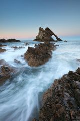 Sunset at Bow Fiddle rock. Photographed at Portknockie, Moray,Scotland.<br /><a href="https://shop.photo4me.com/picture.aspx?id=567839&f=canvas"><font>Buy Print or Canvas</font></a><a></a> <a href="https://shop.photo4me.com/picture.aspx?id=567839&f=canvas"><img src="https://www.photoscotland.net/captionpic/p4me.jpg" alt="p4me.jpg" /></a><a></a>