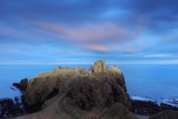 A 240 second long exposure of Dunnottar Castle during civil twilight.<br /><a href="https://shop.photo4me.com/picture.aspx?id=655308&f=canvas"><font color="#f59042">Buy Print or Canvas</font></a><a></a> <a href="https://shop.photo4me.com/picture.aspx?id=655308&f=canvas"><img src="https://www.photoscotland.net/captionpic/p4me.jpg" alt="p4me.jpg" /></a><a></a>