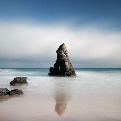 A long exposure at Sango bay with a sea stack reflecting on the shore during the incoming tide.<br /><a href="https://shop.photo4me.com/picture.aspx?id=560205&f=canvas"><font>Buy Print or Canvas </font></a><a href="https://shop.photo4me.com/picture.aspx?id=560205&f=canvas"></a>