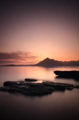 A 120 second exposure taken after the Sun had set behind the Black Cuillin mountains, from the rocky shore of Elgol<br /><a href="https://shop.photo4me.com/picture.aspx?id=584854&f=canvas"><font>Buy Print or Canvas</font></a><a></a> <a href="https://shop.photo4me.com/picture.aspx?id=584854&f=canvas"><img src="https://www.photoscotland.net/captionpic/p4me.jpg" alt="p4me.jpg" /></a><a></a>