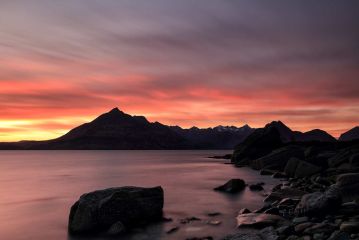 A beautiful Sunset by the rocky shore of Elgol on the Isle of Skye, looking over to the Cuilin mountain range in this 180 second long exposure photograph.<br /><a href="https://shop.photo4me.com/picture.aspx?id=572468&f=canvas"><font>Buy Print or Canvas</font></a><a></a> <a href="https://shop.photo4me.com/picture.aspx?id=572468&f=canvas"><img src="https://www.photoscotland.net/captionpic/p4me.jpg" alt="p4me.jpg" /></a><a></a>