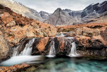 The beautiful clear turquoise water of the Fairy Pools and the Black Cuilin mountain scenery from Glen Brittle<br /><a href="https://shop.photo4me.com/picture.aspx?id=571922&f=canvas"><font>Buy Print or Canvas</font></a><a></a> <a href="https://shop.photo4me.com/picture.aspx?id=571922&f=canvas"><img src="https://www.photoscotland.net/captionpic/p4me.jpg" alt="p4me.jpg" /></a><a></a>
