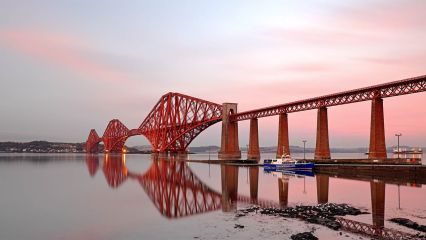 A 229 second long exposure of the Forth rail bridge reflecting on the Firth of Forth during a colourful Sunset.<br /><a href="https://shop.photo4me.com/picture.aspx?id=642496&f=canvas"><font>Buy Print or Canvas</font></a><a></a> <a href="https://shop.photo4me.com/picture.aspx?id=642496&f=canvas"><img src="https://www.photoscotland.net/captionpic/p4me.jpg" alt="p4me.jpg" /></a><a></a>