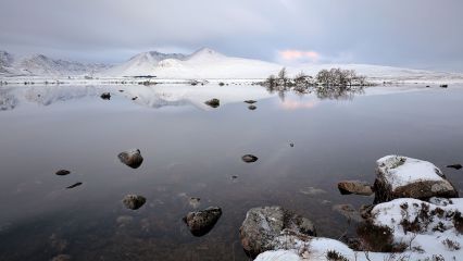 The snow covered Black mount mountain range reflecting on lochan na achlaise during Sunrise. Glencoe, Scotland.<br /><a href="https://shop.photo4me.com/picture.aspx?id=643013&f=canvas"><font>Buy Print or Canvas</font></a><a></a> <a href="https://shop.photo4me.com/picture.aspx?id=643013&f=canvas"><img src="https://www.photoscotland.net/captionpic/p4me.jpg" alt="p4me.jpg" /></a><a></a>