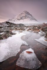 A two minute exposure of a Scottish highland winter landscape with the snow covered Buachaille Etive Mor (the great herdsman of Etive)and ice covered River coupall.<br /><a href="https://shop.photo4me.com/picture.aspx?id=539175&f=canvas"><font>Buy Print or Canvas</font></a><a></a> <a href="https://shop.photo4me.com/picture.aspx?id=539175&f=canvas"><img src="https://www.photoscotland.net/captionpic/p4me.jpg" alt="p4me.jpg" /></a><a></a>