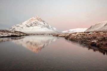 The snow covered Buachaille Etive Mor mountain reflecting on River Etive during Sunrise.<br /><a href="https://shop.photo4me.com/picture.aspx?id=539401&f=canvas"><font>Buy Print or Canvas</font></a><a></a> <a href="https://shop.photo4me.com/picture.aspx?id=539401&f=canvas"></a><a></a>