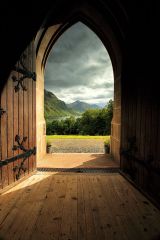 Afternoon light streaming through the arched door at the church of St Mary's and St Fillans at Glenfinnan.<br /><a href="https://shop.photo4me.com/picture.aspx?id=405566&f=canvas"><font color="#f59042">Buy Print or Canvas</font></a><a></a>   <a href="https://shop.photo4me.com/picture.aspx?id=405566&f=canvas"><img src="https://www.photoscotland.net/captionpic/p4me.jpg" alt="p4me.jpg" /></a><a></a>