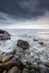 A long exposure from the rocky shore of Clachan on the west coast of Kintyre, Scotland.<br /><a href="https://shop.photo4me.com/picture.aspx?id=482655&f=canvas"><font color="#f59042">Buy Print or Canvas</font></a><a></a>   <a href="https://shop.photo4me.com/picture.aspx?id=482655&f=canvas"><img src="https://www.photoscotland.net/captionpic/p4me.jpg" alt="p4me.jpg" /></a><a></a>