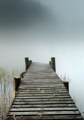 A jetty leading in to a mist covered Loch Ard.<br /><a href="https://shop.photo4me.com/picture.aspx?id=338198&f=canvas"><font>Buy Print or Canvas</font></a><a></a> <a href="https://shop.photo4me.com/picture.aspx?id=338198&f=canvas"><img src="https://www.photoscotland.net/captionpic/p4me.jpg" alt="p4me.jpg" /></a><a></a>
