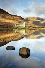 The ruin of Kilchurn Castle and mountains reflecting off Loch Awe, Argyll and Bute, Scotland..<br /><a href="https://shop.photo4me.com/picture.aspx?id=342652&f=canvas"><font>Buy Print or Canvas</font></a><a></a> <a href="https://shop.photo4me.com/picture.aspx?id=342652&f=canvas"><img src="https://www.photoscotland.net/captionpic/p4me.jpg" alt="p4me.jpg" /></a><a></a>