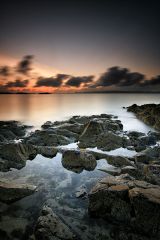 A long exposure during Suset from the rocky shore of Morar beach, North west Scotland.
<br /><a href="https://shop.photo4me.com/picture.aspx?id=403475&f=canvas"><font color="#f59042">Buy Print or Canvas</font></a><a></a>   <a href="https://shop.photo4me.com/picture.aspx?id=403475&f=canvas"><img src="https://www.photoscotland.net/captionpic/p4me.jpg" alt="p4me.jpg" /></a><a></a>