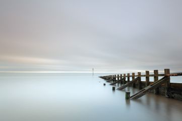 A 159 second minimalistic long exposure of sea groynes leading into the sea at Portobello beach, Edinburgh.<br /><a href="https://shop.photo4me.com/picture.aspx?id=642960&f=canvas"><font>Buy Print or Canvas</font></a><a></a> <a href="https://shop.photo4me.com/picture.aspx?id=642960&f=canvas"><img src="https://www.photoscotland.net/captionpic/p4me.jpg" alt="p4me.jpg" /></a><a></a>