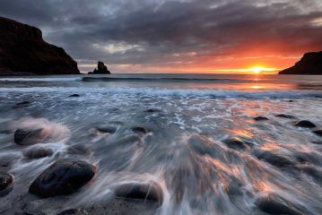 Sunset at the rocky shore of Talisker bay on the Isle of Skye, Scotland.<br /><a href="https://shop.photo4me.com/picture.aspx?id=660918&f=canvas"><font>Buy Print or Canvas</font></a><a></a> <a href="https://shop.photo4me.com/picture.aspx?id=660918&f=canvas"></a><a></a>